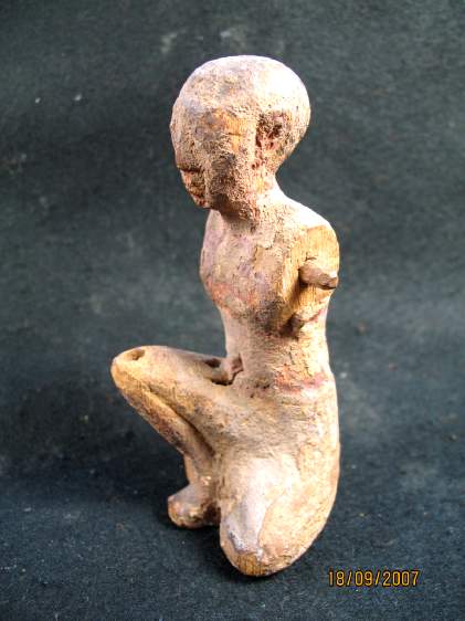 1571. **SOLD** Good fragmentary Middle Kingdom wooden boatman