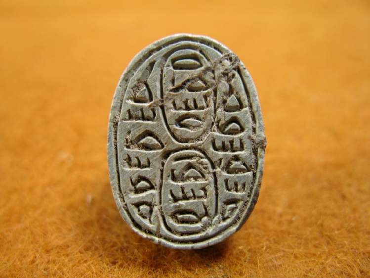 4310. **SOLD**  15th dynasty scarab with pseudo cartouches