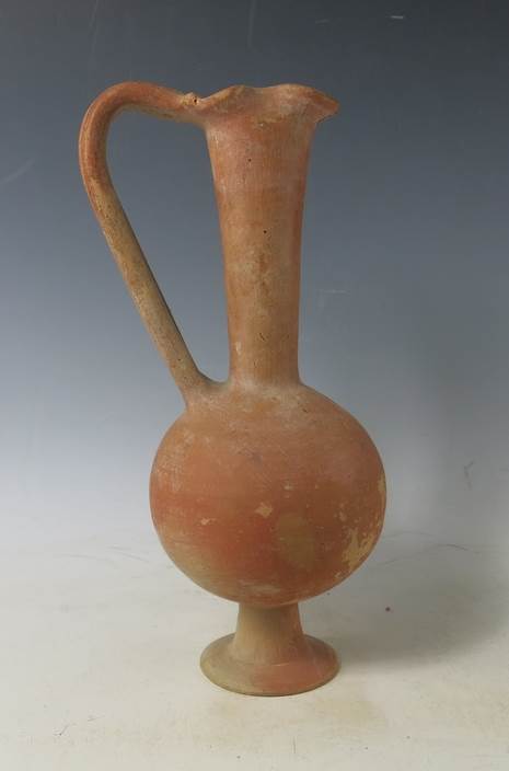 6099. Phoenician trefoil oinochoe in Red Slip ware 