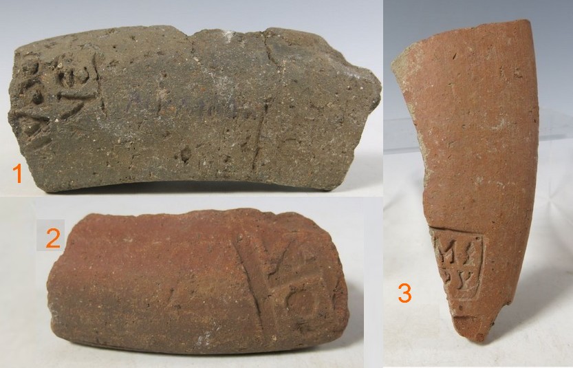 5297. Collection of fragmentary stamped Roman mortarium rims.