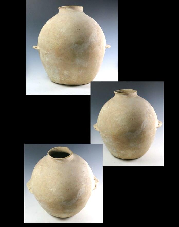 4781.  A very large Early Bronze Age ledge handle jar    