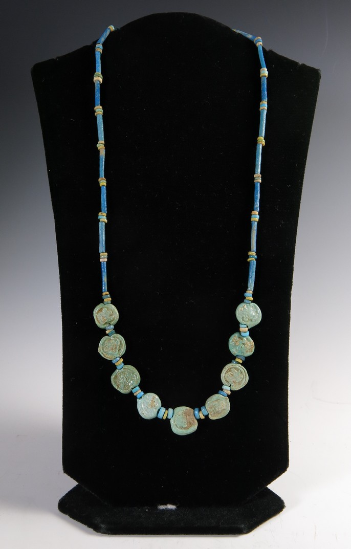 5462. Very interesting wearable necklace of faience Bes plaques