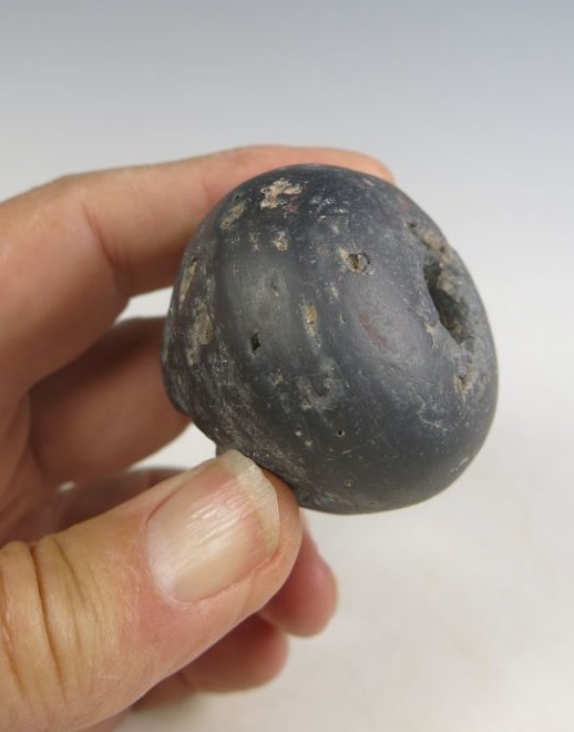6009. Stone mace head in an unusual stone
