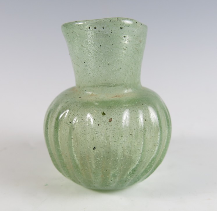 **SOLD** A rather elegant little glass bottle.