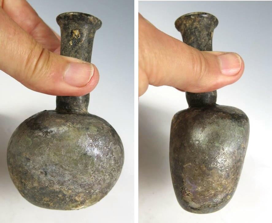 5202.  Unusual and interestingly shaped Roman glass bottle.
