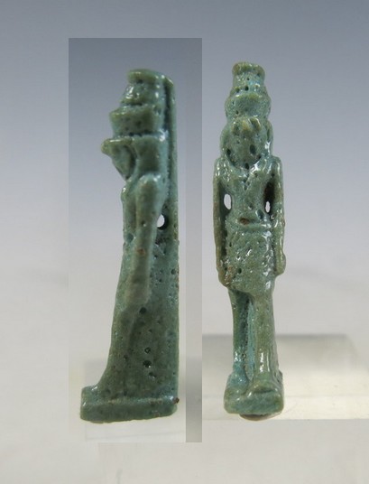 6078. Very fine green faience amulet of Re Horakhty