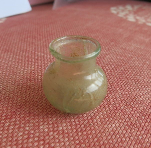 6049. Charming little Roman glass bottle.