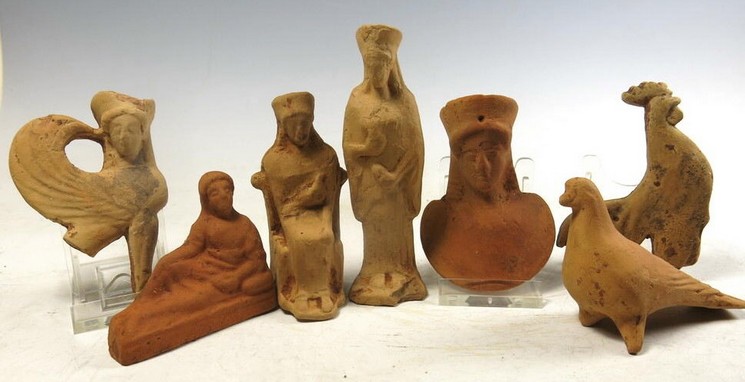 6030. Group of Archaic Greek terracotta votive figurines.