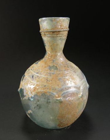 5674. **SOLD** Unusual Roman glass bottle with lovely and graceful trailing 