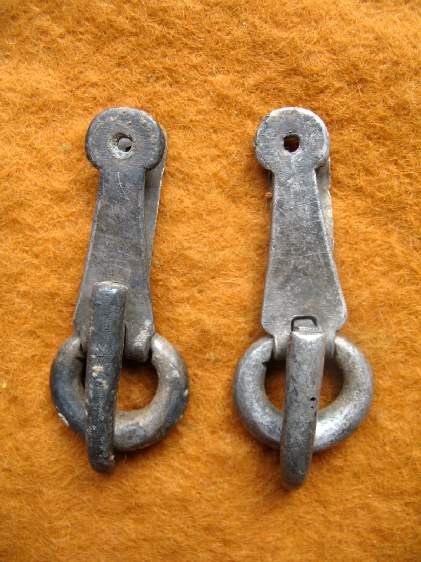 1799. A fine PAIR of SILVER Roman military buckles.