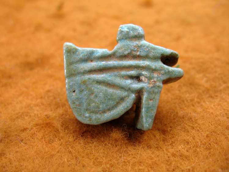 4489. Light blueish green faience wedjat amulet