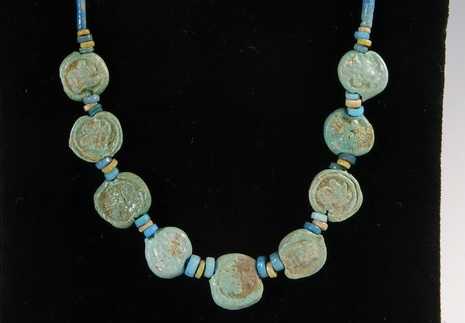 5462. Very interesting wearable necklace of faience Bes plaques