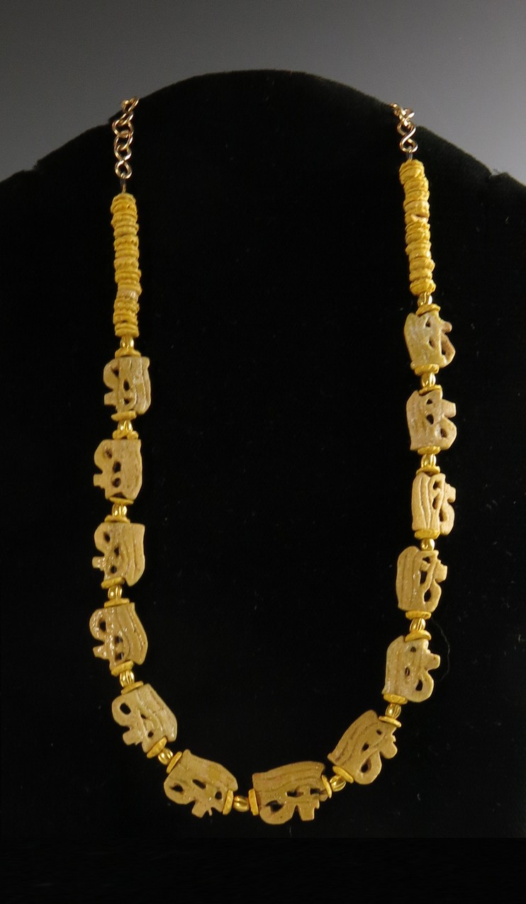 **SOLD** Superb necklace : rare yellow faience open-work Wedjat amulets.
