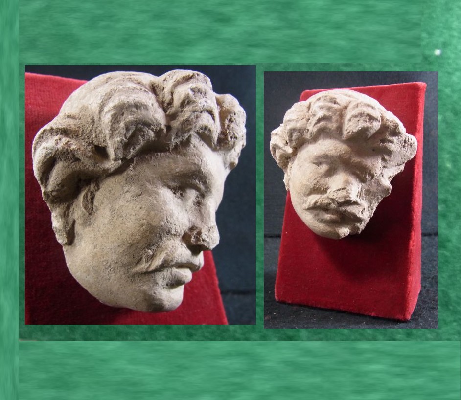5393.**SOLD**  An attractive stucco Gandara head 