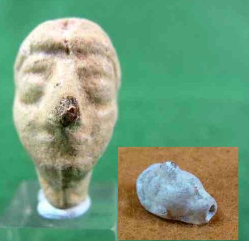 4935. Unusual white faience head amulet